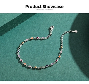 Detail of S925 silver bracelet featuring colorful faceted stones in bezel settings
