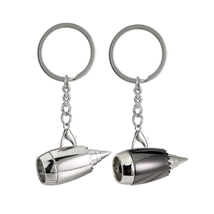 Custom airplane engine model keychain in polished silver and gunmetal gray finishes