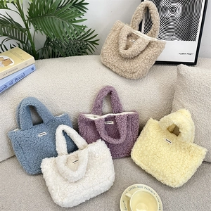 Collection of plush fleece handbags in beige, blue, purple, and white for autumn and winter