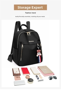 Detail view of black nylon backpack showing large capacity for laptop and daily essentials