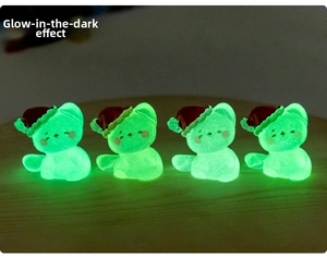 Micro landscape Christmas cats with green luminous effect in dark environments
