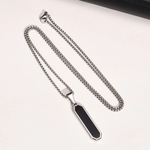 Minimalist geometric rhombic pendant necklace with black enamel inlay and box chain
