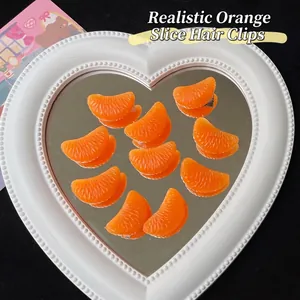 Realistic orange slice hair clip accessories on heart shaped mirror tray set of ten