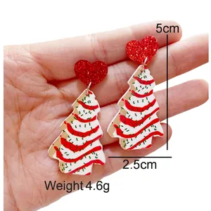 Detail shot of acrylic Christmas tree earrings with glitter hearts, size 5cm x 2.5cm