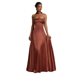 Elegant rust-colored satin strapless maxi gown with matching neck scarf accessory