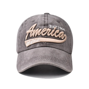 Close-up of 3D America embroidery and EST.1964 text on washed cotton baseball cap