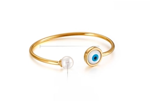 Detail of gold evil eye and shell pearl cuff bracelet with 56x2.5mm size specs