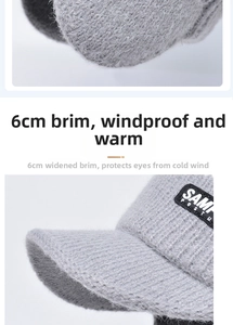 Detail of grey winter knit cap featuring a 6cm brim for windproof protection