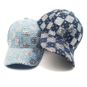 Denim baseball caps with silver sequin checkerboard pattern in light and dark blue