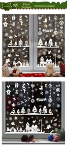 White Christmas window stickers with elk, trees, and snowflakes on a glass window