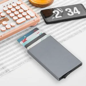 Aluminum RFID blocking automatic pop-up credit card holder in matte grey finish