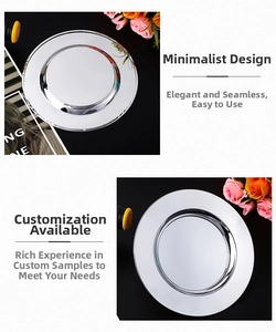 Close-up of polished stainless steel round serving tray with a smooth mirror finish