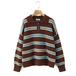 Retro striped polo sweater in brown and blue knit with three buttons on hanger
