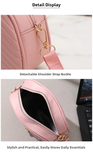 Detail showing pink leather shell bag with detachable strap and golden metal hardware