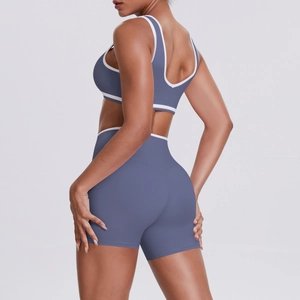 Detailed side view of high-waisted yoga set with contrast binding and supportive fit