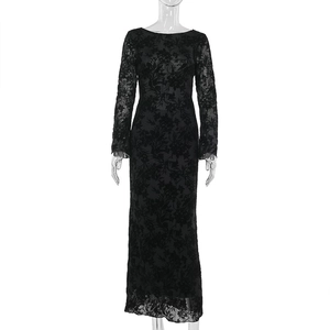 Detail of black floral lace fabric and sheer texture on a slim fit long sleeve maxi dress
