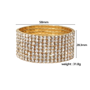 Luxurious wide copper bangle with multi-row zircon crystals and dimensions 58x28mm