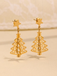 Macro shot of 18K gold plated 3D hollow Christmas tree earrings with star stud detail