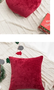 Close-up of red velvet Christmas cushion with soft texture and festive holiday decor