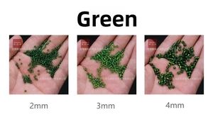 Size comparison of 2mm, 3mm, and 4mm green silver-lined glass seed beads on a palm