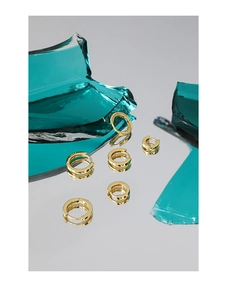 Close-up of S925 hallmark on polished gold-plated sterling silver hoop earrings set