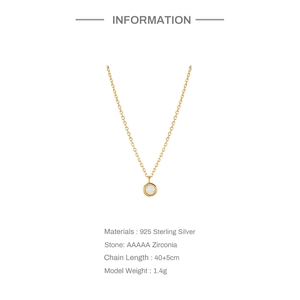 Detail showing 925 sterling silver chain with a round zirconia pendant on white background