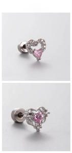 Detailed macro view of pink heart zircon stud earrings with silver metal screw back