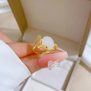 Gold fox white jade ring with zircon accents on an adjustable band for women