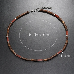 Detail view of ethnic wood bead necklace showing 45+5cm length and red stone size