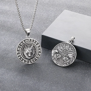 Detailed relief of Viking wolf and runic symbols on retro silver stainless steel pendants