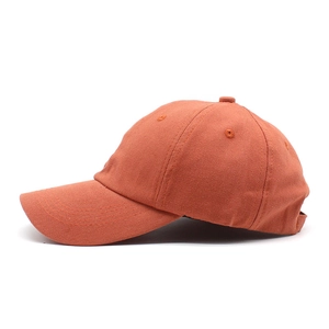 Close-up of caramel cotton baseball cap side view showing fabric texture and stitching