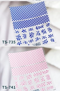 Detail view of 5D embossed checkerboard nail stickers in blue and pink wavy patterns