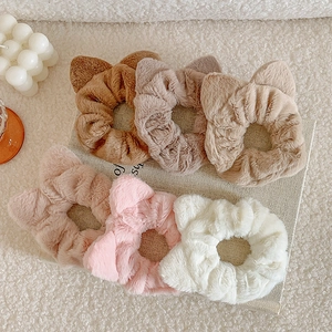 Cute plush cat ear scrunchies set in six soft colors including pink and grey