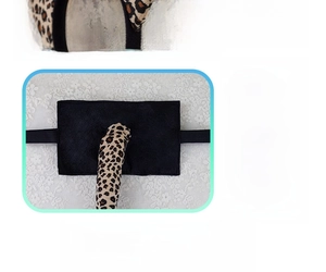 Detail of plush leopard cat ears headband and tail with a sturdy felt board structure