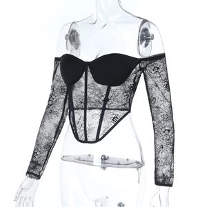 Detailed view of black lace off-the-shoulder corset top with intricate floral patterns