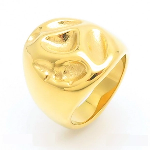 Chunky gold irregular lava ring with textured molten surface in polished stainless steel