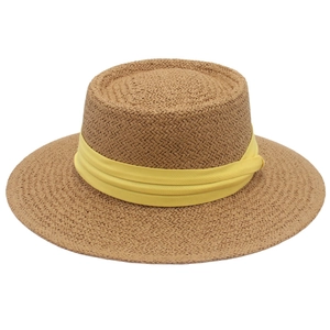 Flat top straw hat with wide brim and triple-layered yellow ribbon for summer vacation style
