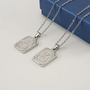 Polished silver stainless steel rectangle pendant necklaces with engraved letters A and K