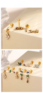 Detailed view of titanium labret studs with zircon pendants in various geometric shapes