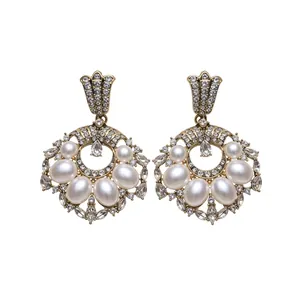 Vintage gold plated hollow round drop earrings with pearls and rhinestones for women