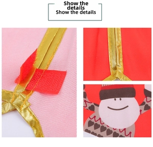 Detail showing the golden edge weaving, red velcro closure and snowman print on tree skirt