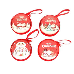 Set of four red round Christmas coin purses with Santa, snowman and reindeer designs