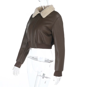Side view of brown PU leather jacket featuring faux shearling collar and ribbed hem details