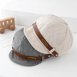 Classic striped baby nautical caps in grey and beige with leather decorative straps
