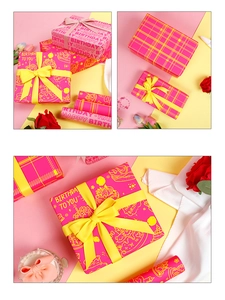 Détail du papier cadeau d'anniversaire rose néon avec ruban jaune et lettrage