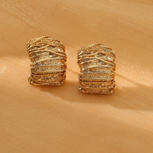 French vintage style twisted gold hoop earrings with textured multi-layer metal design