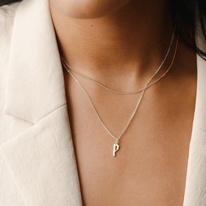Elegant layered necklace featuring a Gothic letter P initial pendant for women.