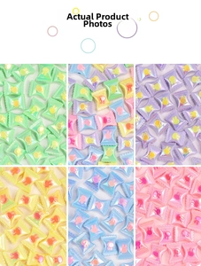 Detailed grid view of candy-shaped acrylic beads with rabbit motifs in six pastel colors