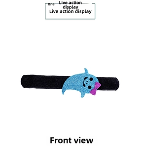 Front view of a Halloween slap bracelet featuring a blue glittery shark with pink bow