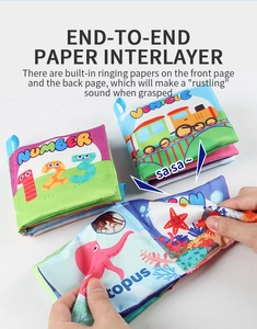 Detail of baby cloth book with crinkle paper layers for sensory early learning